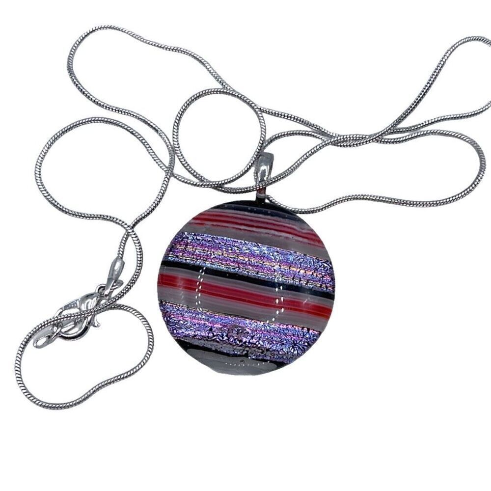 Striped shimmering glass pendant and silver chain.